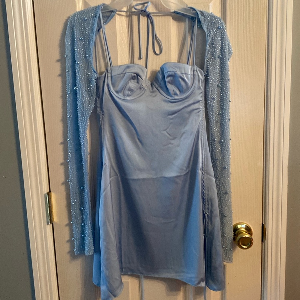 Never worn, light blue semi formal dress